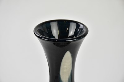 Lot 95 - MOORCROFT; a large baluster shaped vase,...