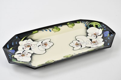 Lot 65 - MOORCROFT; a rare and unusual 'Au Lait' eleven...