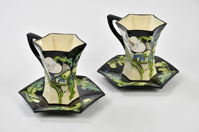 Lot 65 - MOORCROFT; a rare and unusual 'Au Lait' eleven...