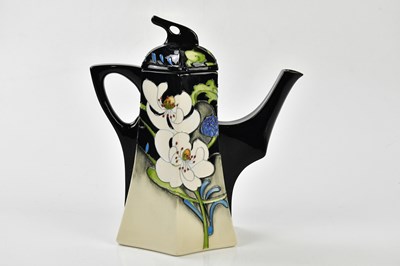 Lot 65 - MOORCROFT; a rare and unusual 'Au Lait' eleven...