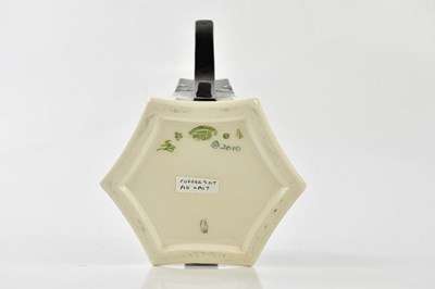 Lot 65 - MOORCROFT; a rare and unusual 'Au Lait' eleven...