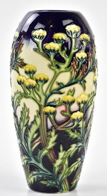 Lot 123 - MOORCROFT; an ovoid form vase decorated in the...