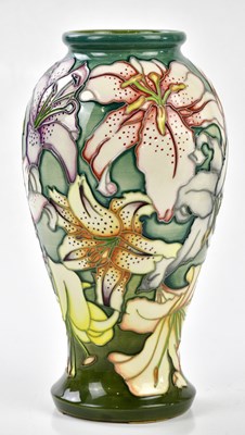 Lot 94 - MOORCROFT; a large vase of shouldered form...