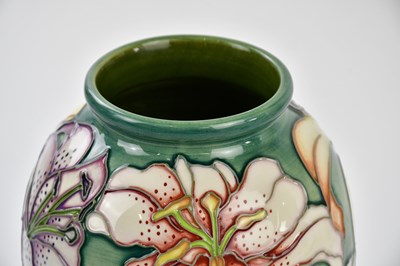 Lot 94 - MOORCROFT; a large vase of shouldered form...