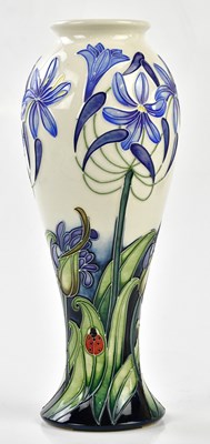 Lot 129 - MOORCROFT; an inverted baluster vase,...