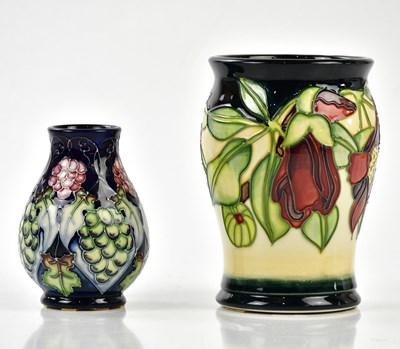 Lot 130 - MOORCROFT; two vases including a cylindrical...