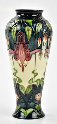 Lot 152 - MOORCROFT; a vase of shouldered form decorated...