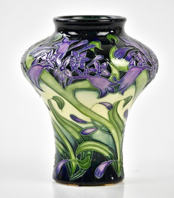 Lot 147 - MOORCROFT; a vase of shouldered form decorated...