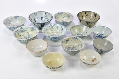 Lot 1151 - A group of thirteen shipwreck Chinese bowls...