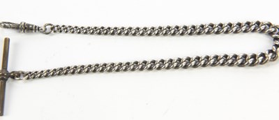 Lot 3039 - A hallmarked silver watch chain and T-bar,...