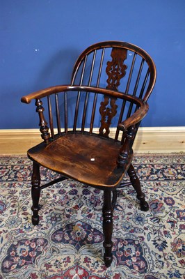 Lot 2418 - A 19th century yew wood Windsor chair with...