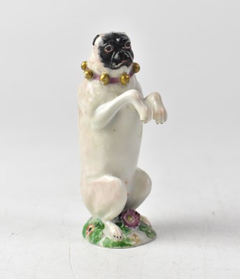 Lot 413 - CHELSEA; a c.1760 porcelain model of a begging...