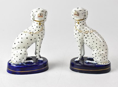 Lot 388 - A pair of Staffordshire models of Dalmatians,...