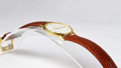 Lot 1055 - APPELLA; an 18ct gold wristwatch, the white...