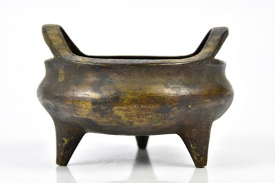 Lot 1111 - A Chinese bronze censer with pierced loop...