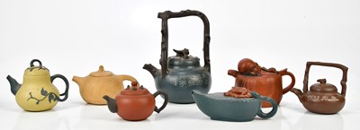 Lot 1041 - Seven Chinese Yixing teapots, one with...