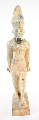 Lot 365 - A large Egyptian carved stone figure, height...