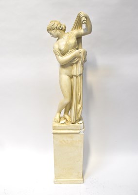 Lot 92 - A contemporary plaster sculpture of a scantily...