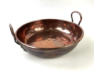 Lot 6369 - A 19th century copper twin handled jam pan,...