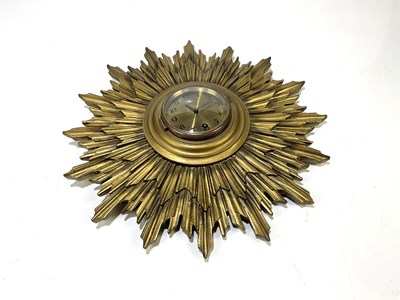 Lot 207 - A gilt painted wooden sun clock, with brass...