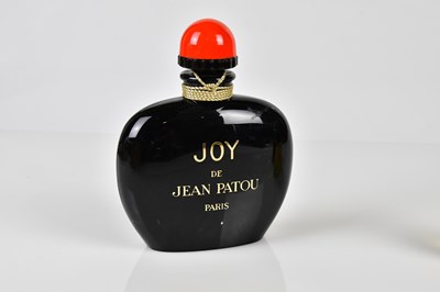Lot 967 - JOY DE JEAN PATOU; a large black glass perfume...