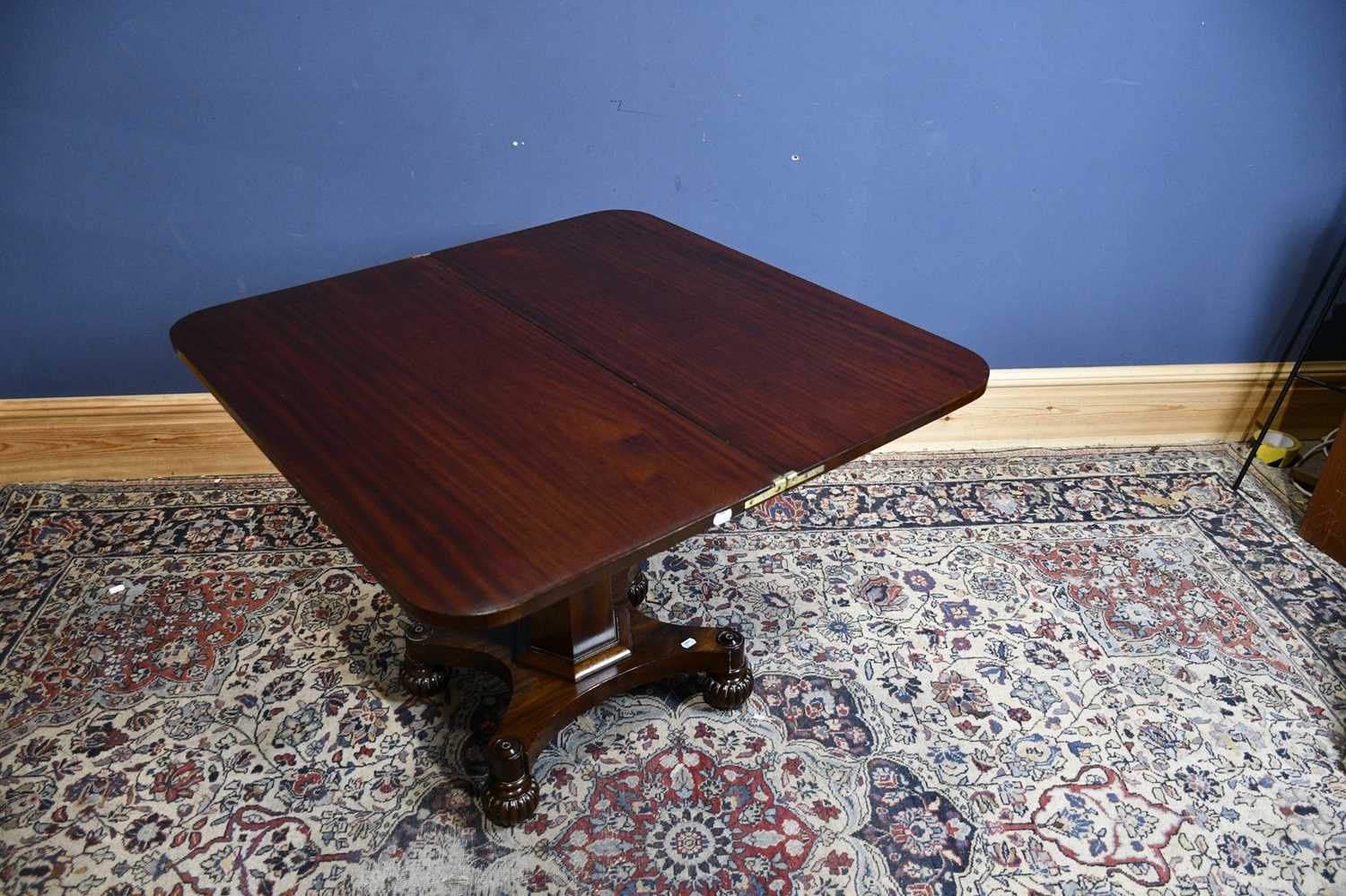 Lot 6591 - A 19th century mahogany tea table, with...