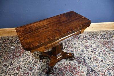 Lot 6591 - A 19th century mahogany tea table, with...