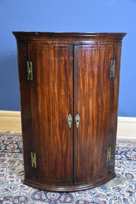 Lot 139 - An early 19th century mahogany two door...