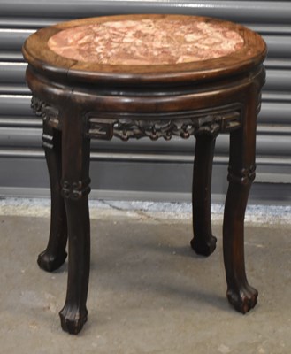 Lot 45 - A Chinese carved hardwood marble topped stand,...