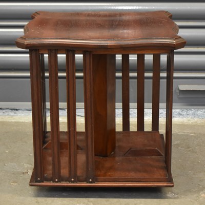 Lot 101 - A small Edwardian mahogany revolving tabletop...