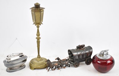 Lot 416 - An early 20th century brass table lighter...