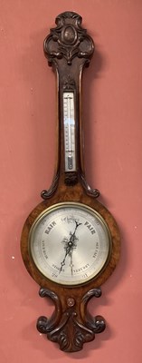 Lot 6375 - A Victorian walnut barometer with silvered...