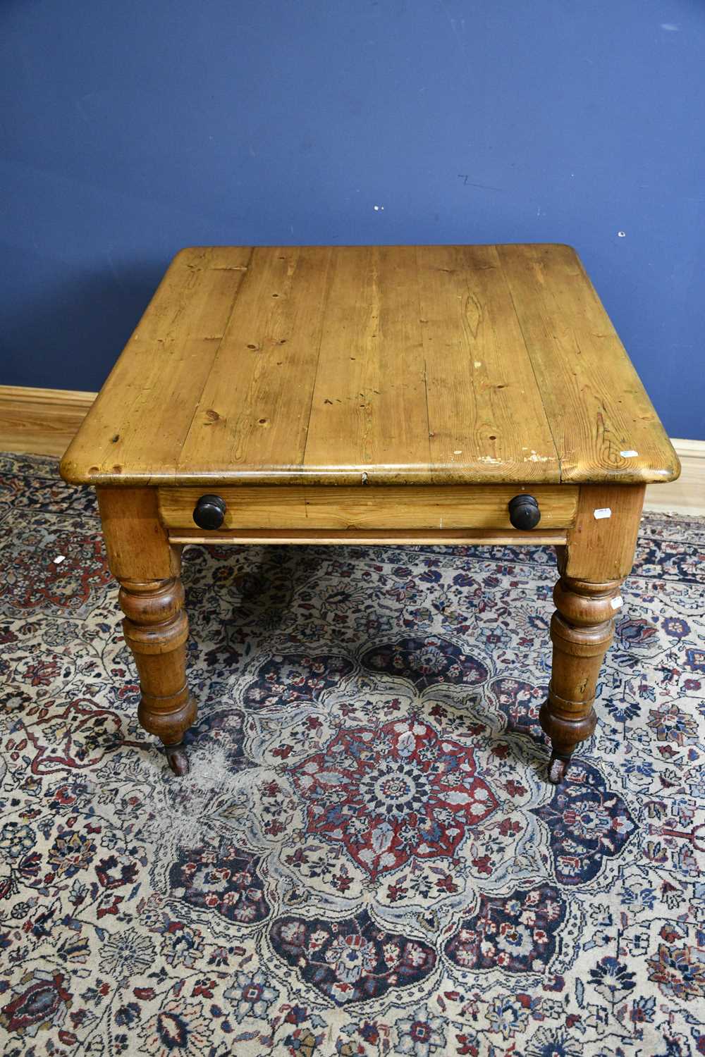 Lot 6590 A Victorian pine kitchen table with end
