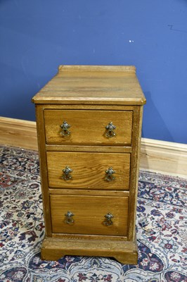 Lot 6697 - A late Victorian ash narrow three drawer chest...