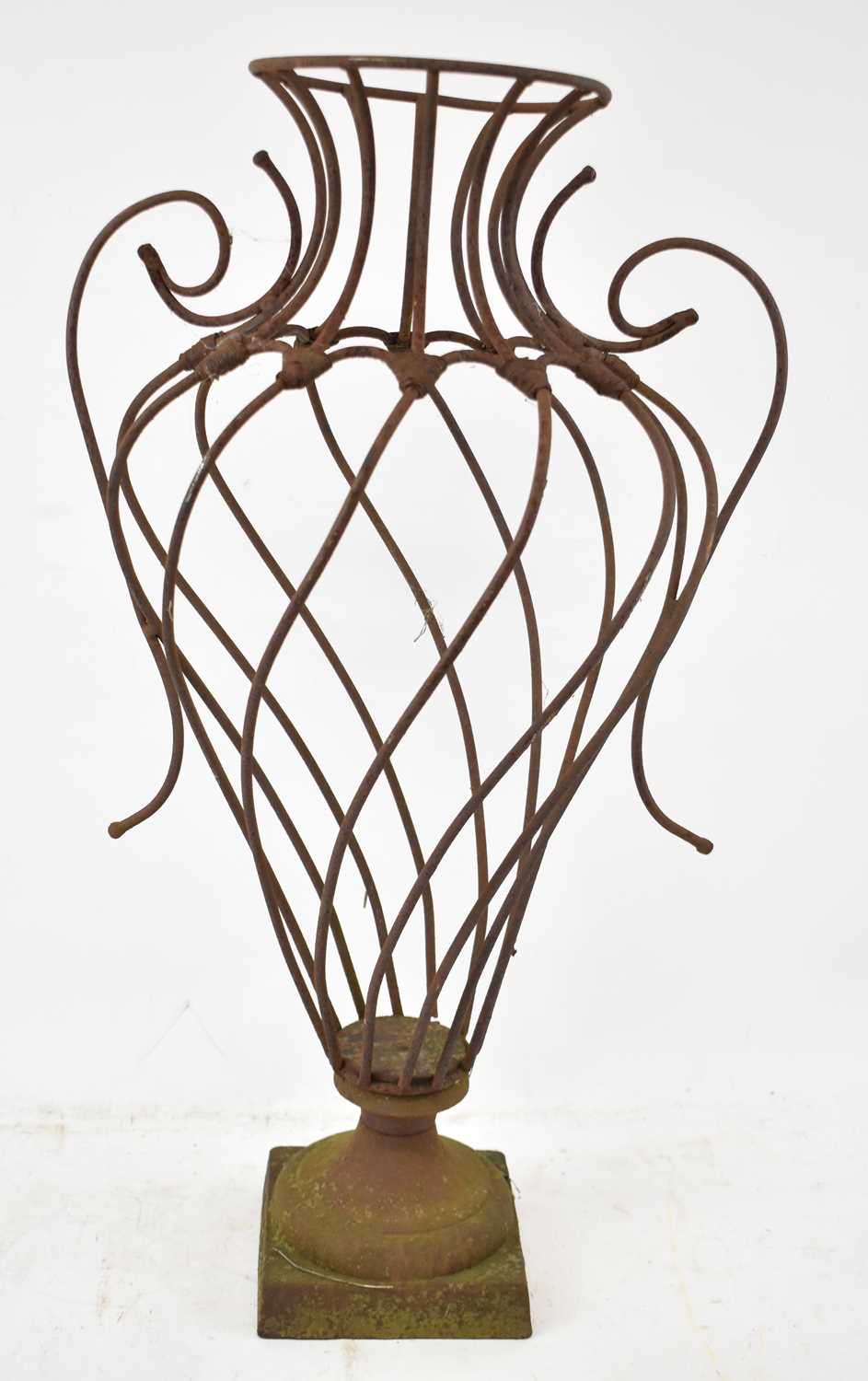 Lot 153 - A decorative wrought iron openwork urn, height...