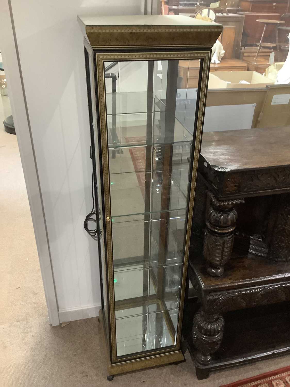 Lot 2645 - A modern illuminated glass display cabinet...