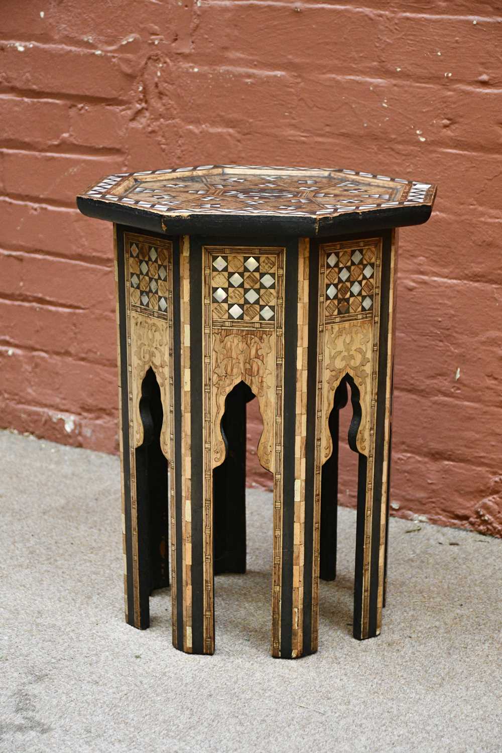 Lot 2538 - An Eastern occasional table with mother of