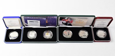 Lot 956 - Four cased sets of UK silver proof coins...