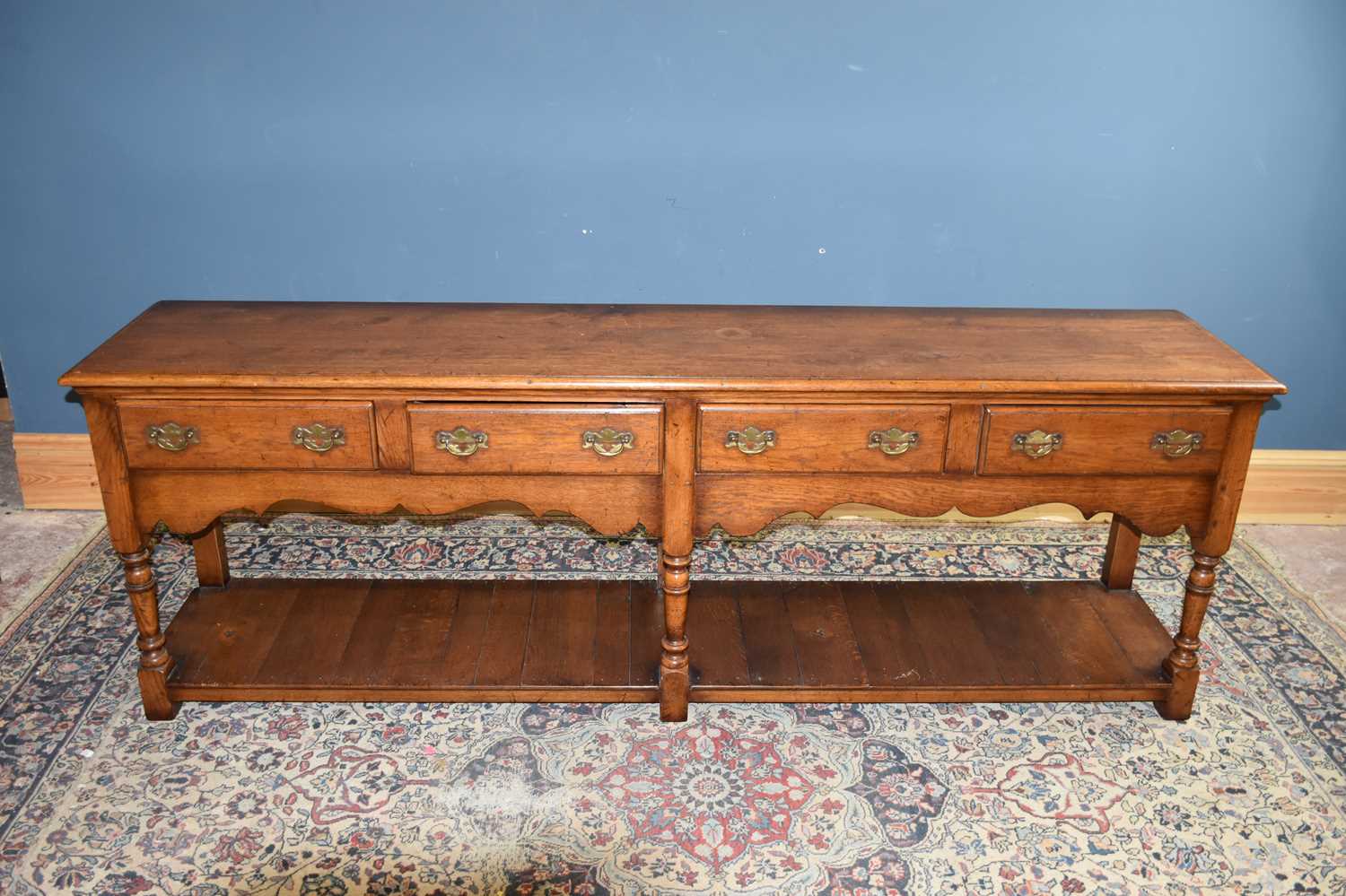 Lot 6720 - A reproduction Titchmarsh & Goodwin style oak...