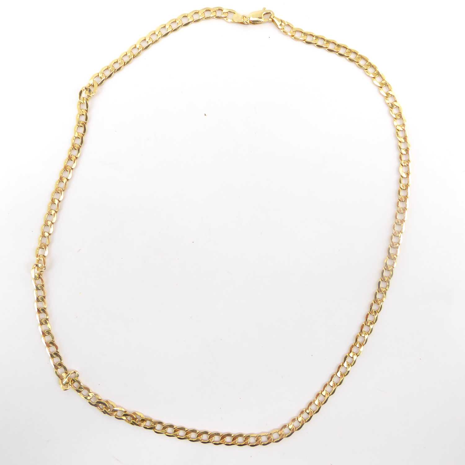 Lot 976 - A 9ct bright gold flat curb necklace