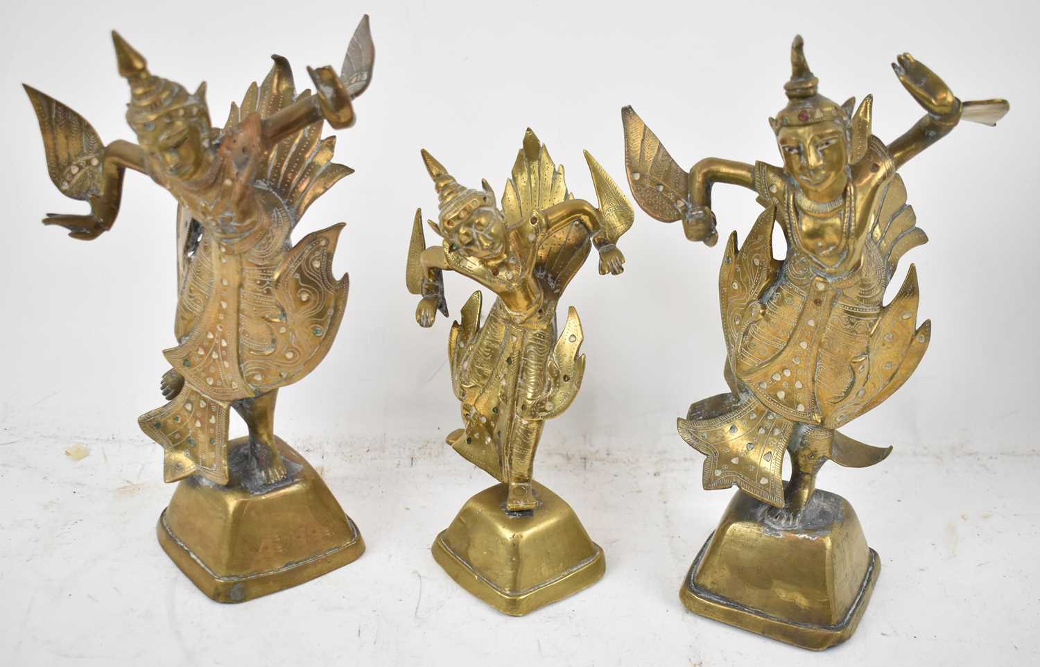 Lot 638 - Three late 19th century Indian brass figures