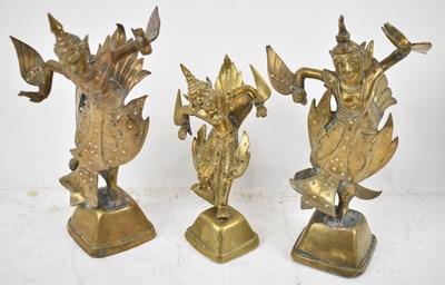 Lot 638 - Three late 19th century Indian brass figures...