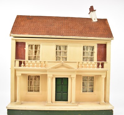 Lot 442 - TRI-ANG; a mid 20th century dolls' house, with...