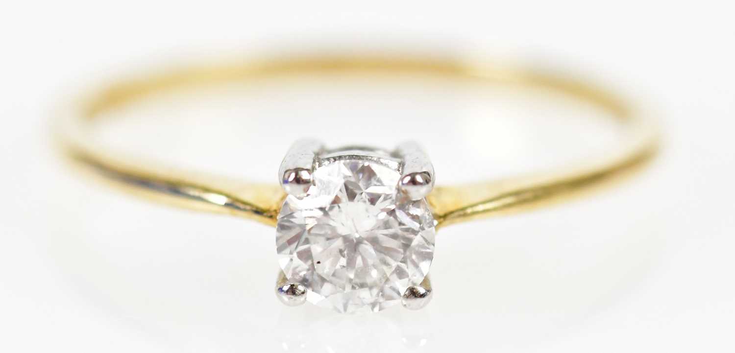 Lot 136 - A 9ct yellow gold diamond solitaire ring, the...