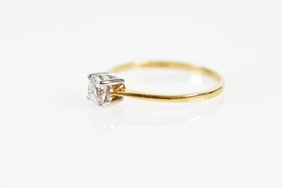 Lot 136 - A 9ct yellow gold diamond solitaire ring, the...