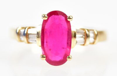 Lot 273 - A 14ct yellow gold synthetic ruby and diamond...