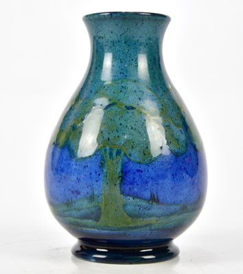 Lot 113A - WILLIAM MOORCROFT; a baluster shaped vase,...