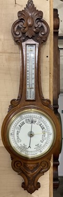 Lot 6379 - A 1920s oak carved barometer, 92cm.