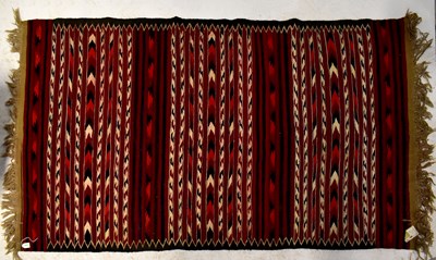 Lot 84 - An Afghan Kilim red ground rug