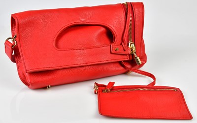 Lot 337 - TOM FORD; a red grained leather Alix clutch...